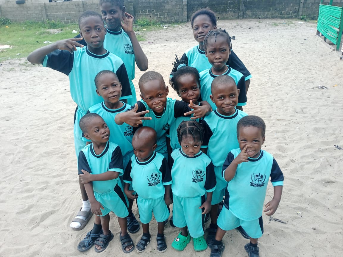 Students in teal sports uniforms